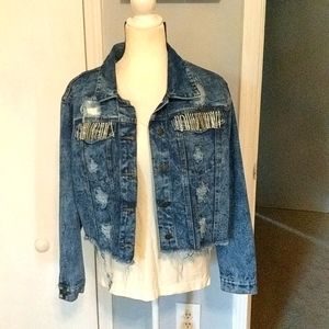 Distressed cropped jean jacket with rhinestone fringe